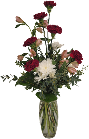 6 Carnations in a vase with assorted flowers