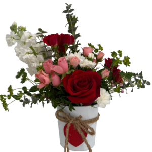 Valentine heart bucket with white stock, red and pink roses with mixed greens