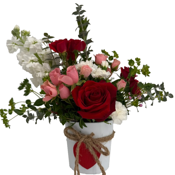 Valentine heart bucket with white stock, red and pink roses with mixed greens