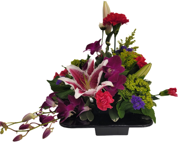 Modern style floral arrangement with brightly colored flowers with a stargazer lily and orchid.